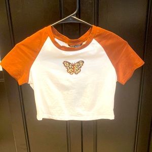 Brown crop top with cheetah print butterfly